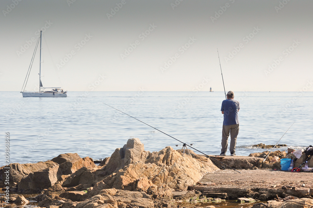 fisherman on the coastline