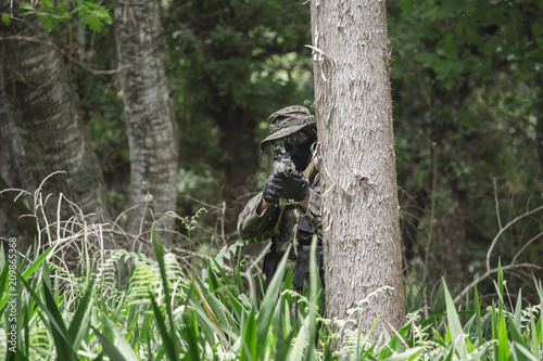Airsoft soldier in the woods