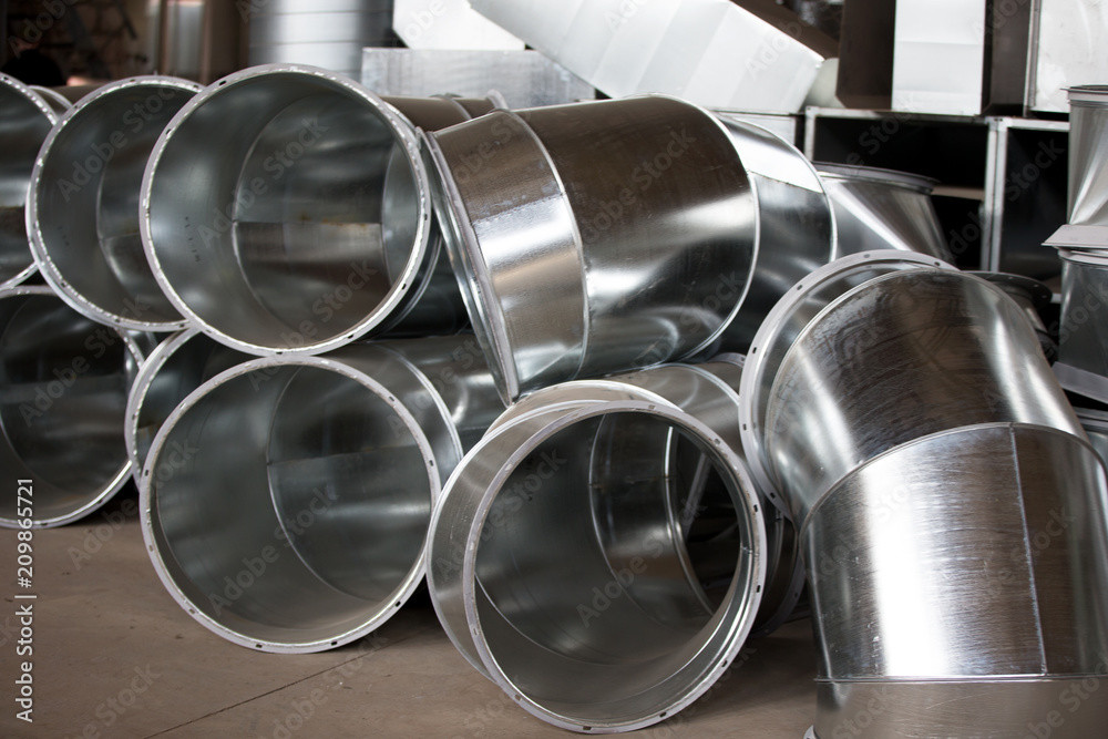 Workshop in the factory for the manufacture of ventilation pipes. Ventilation metal pipes. Workshop in the factory for the manufacture of ventilation pipes. Ventilation metal pipes.