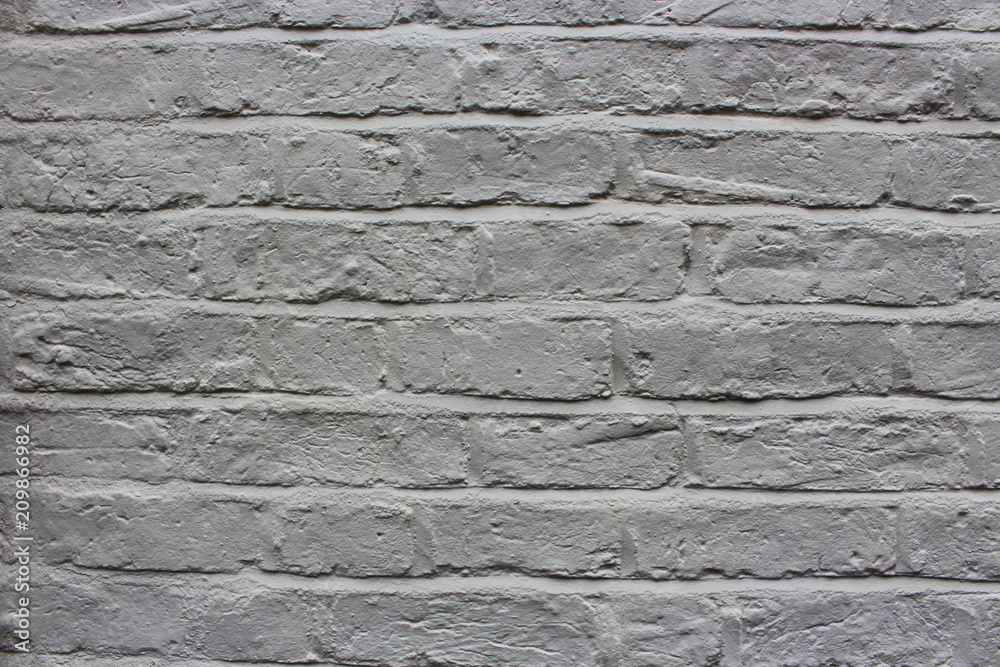 Abstract weathered textured brick wall background.