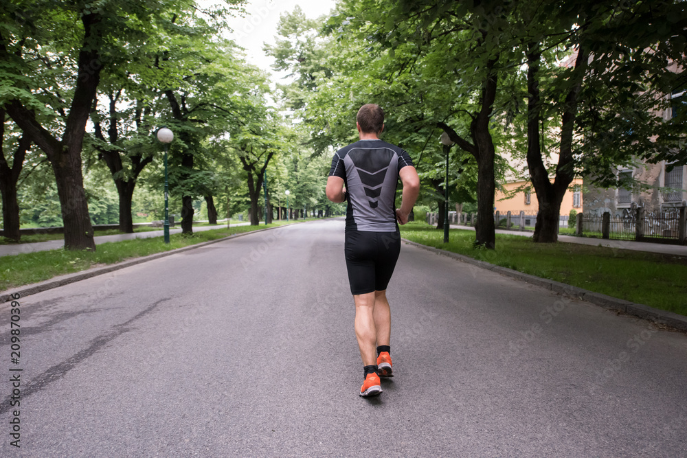 male runner training for marathon