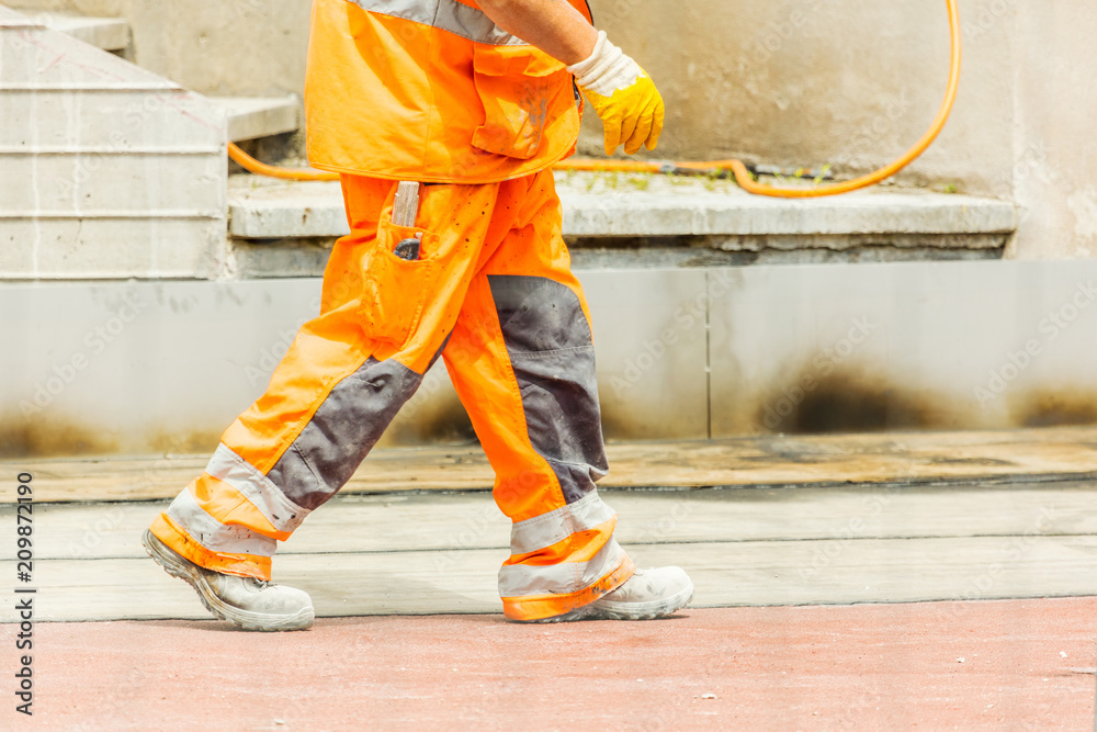 Strassenarbeiter bei der Arbeit Strassenarbeiter bei der Arbeit