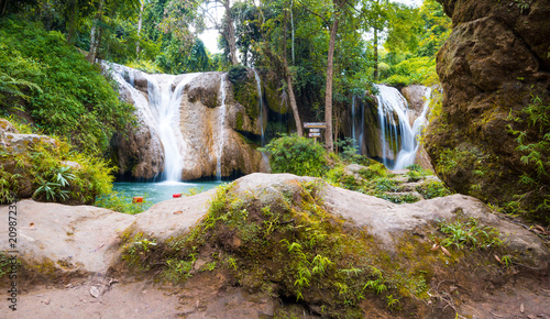 Fototapeta Naklejka Na Ścianę i Meble -  Thanawan Waterfall beautiful There is water throughout the year. The water is emerald green. Located in Doi Phu Nang National Park, Phayao, Thailand. Waterfall nature landscape