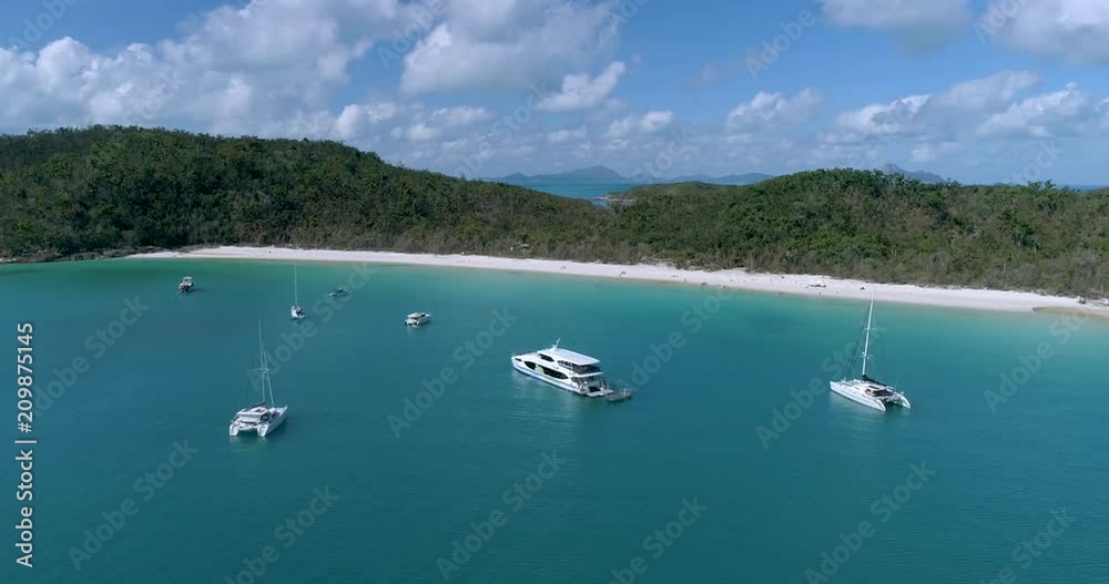 White Haven Beach, Queensland / Australia - September 2017 - Tracking shot behind the boats looking towards the beach White Haven Beach, Queensland / Australia - September 2017 - Tracking shot behind the boats looking towards the beach