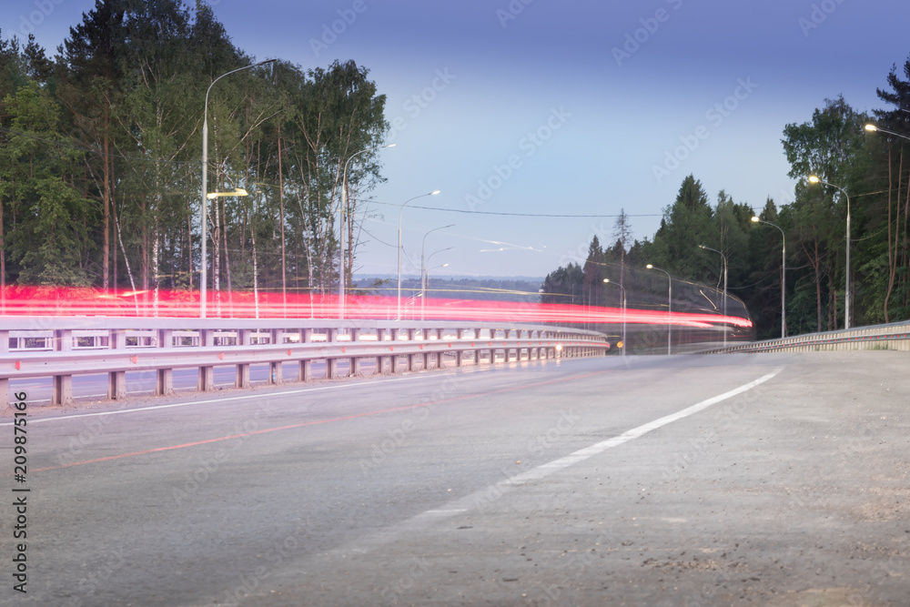 the light trails on the Central Ring Road Moscow. Near Zvenigorod city