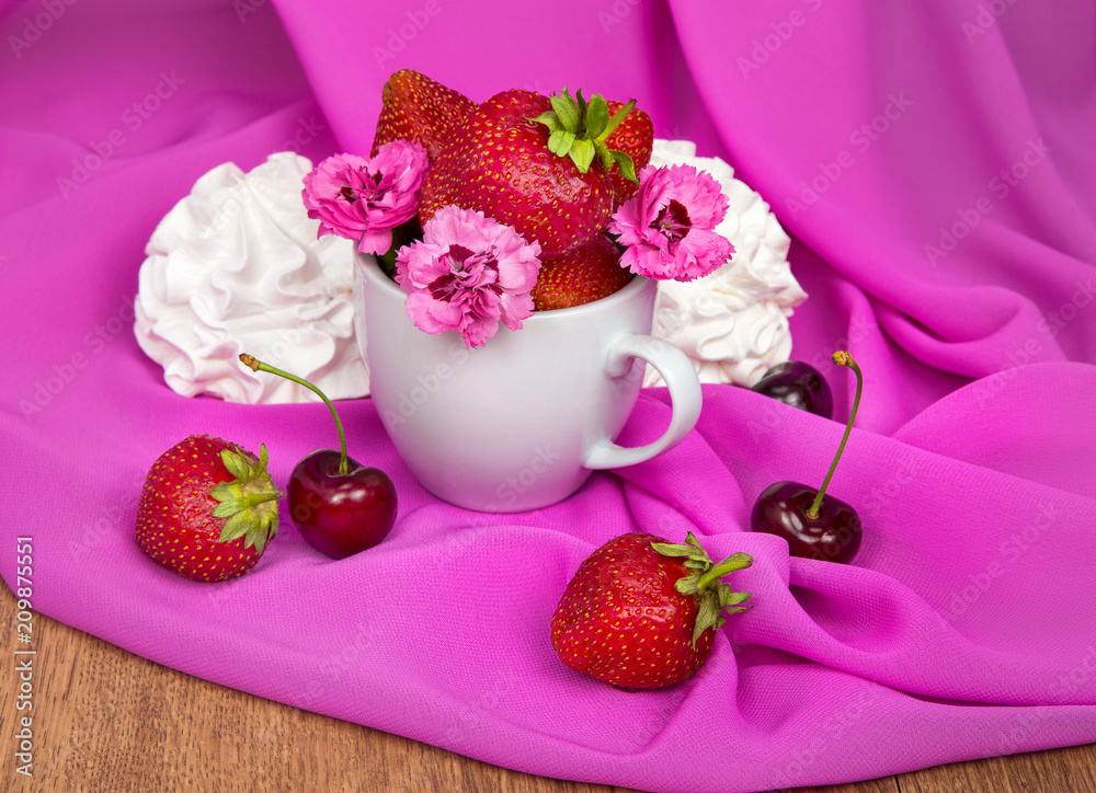 cup with strawberries, flowers, cherries on a pink background cup with strawberries, flowers, cherries on a pink background
