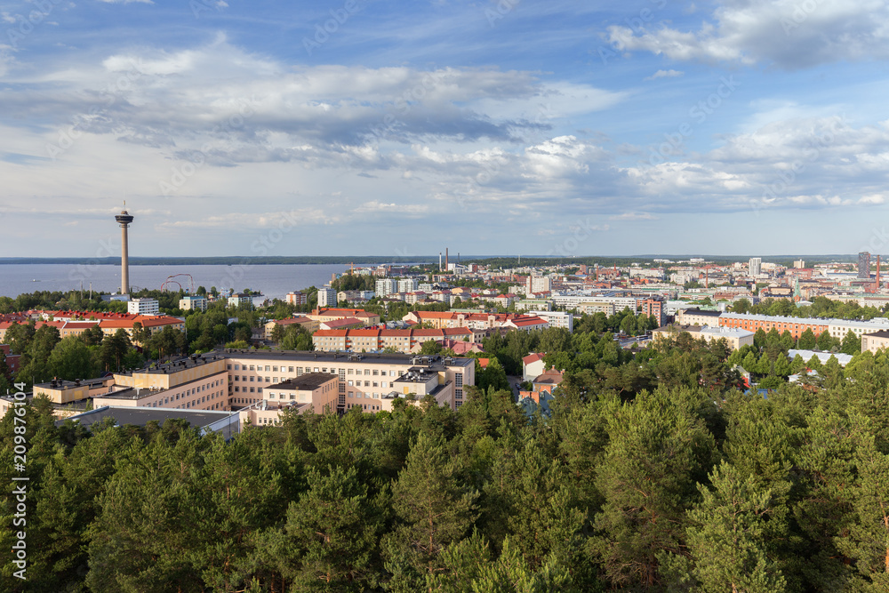 Näsinneula observation tower and the city of Tampere, Finland, viewed from above on a sunny day in the summer.