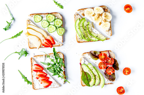 homemade sandwiches composition on white table background top vi