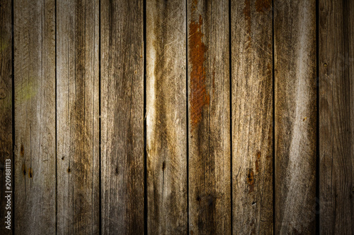 Vintage background of old weathered brown boards
