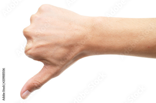 Hand shows thumb down isolated on white background