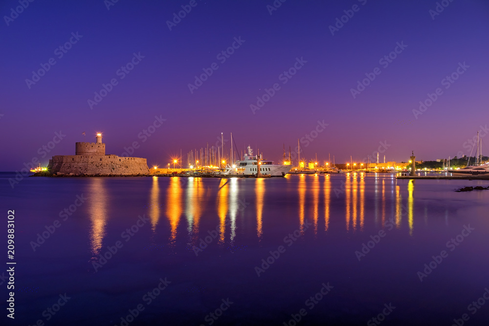 Fototapeta premium Windmills at Mandraki Harbour