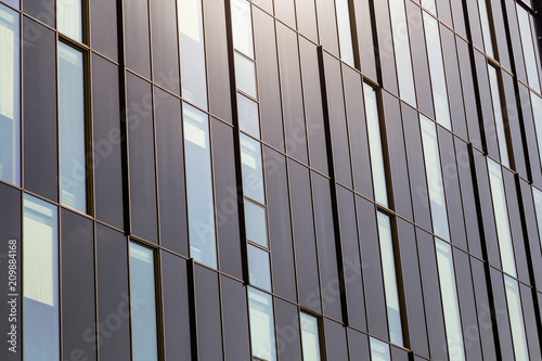 Windows of a modern high-tech building close-up, like a background