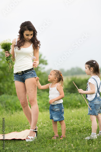 woman and children in nature