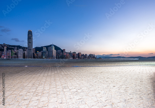 Photography poanoramic hongkong city skyline with empty square