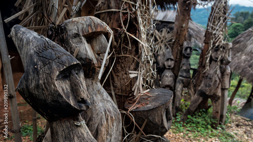 Wooden ghost doll statue in Chiang Rai photo