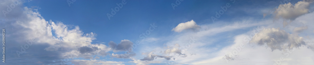 Blue sky with fluffy clouds. Panorama sky background