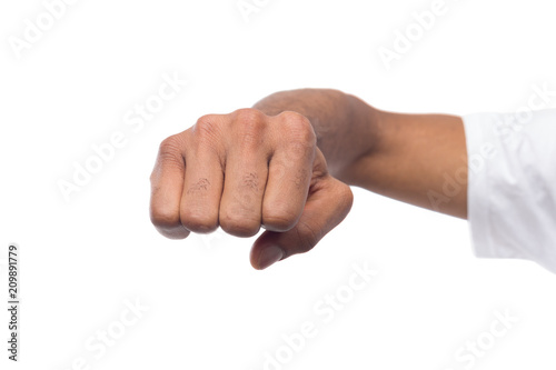 Fight hand gesture of black man, isolated photo