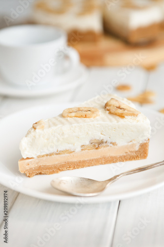 Delicious banana cake on table