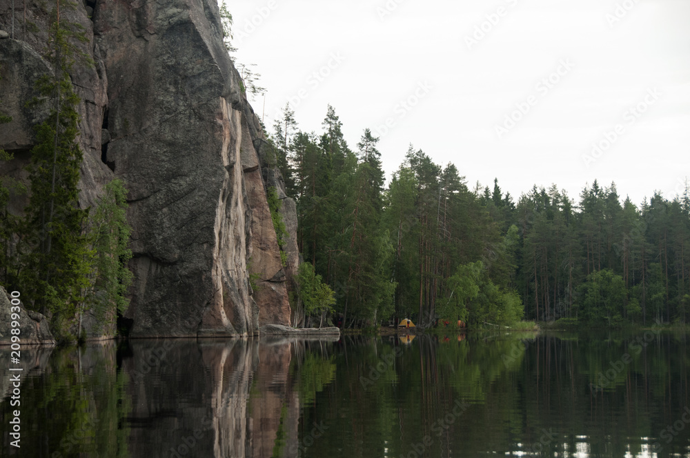 Granite rocks near the forest lake