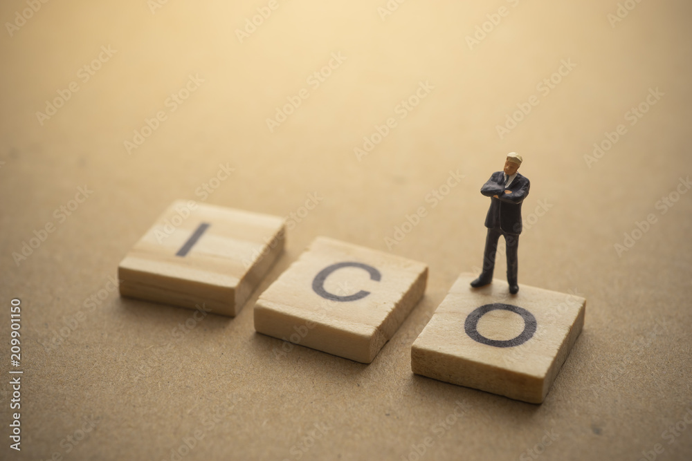 Businessman thinking about invest ICO initial coin offering concept Businessman thinking about invest ICO initial coin offering concept