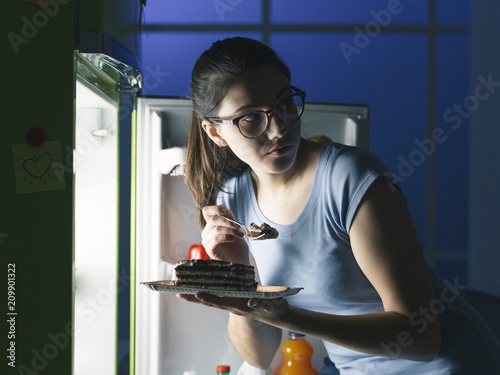 Woman having a late night snack