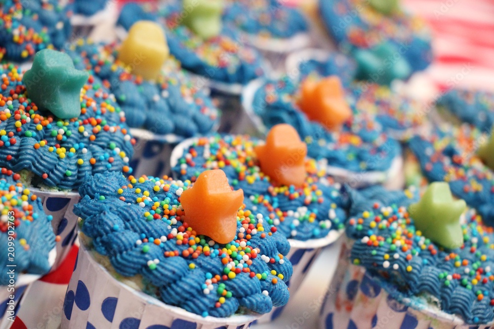 Blue star and sprinkle party cupcakes