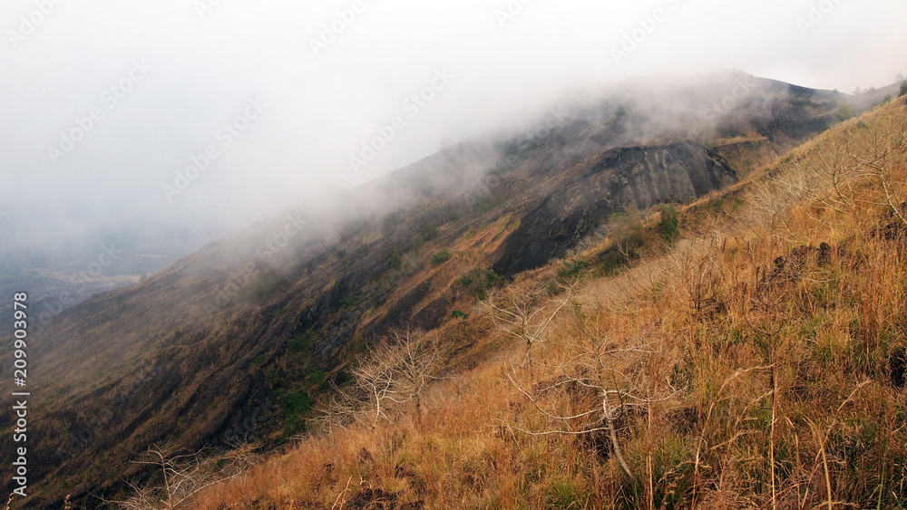 cloudy view over Mount Batur during sunrise tour, Bali, Indonesia