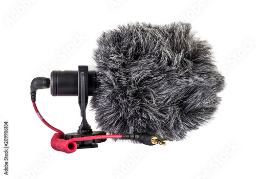 A directional compact external microphone for cameras and SLR cameras, with anti-vibration mount and synthetic fluffy windproof.