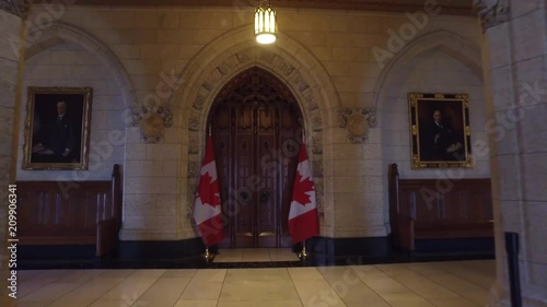 Camera dolly away from house of commons door in parliament  photo
