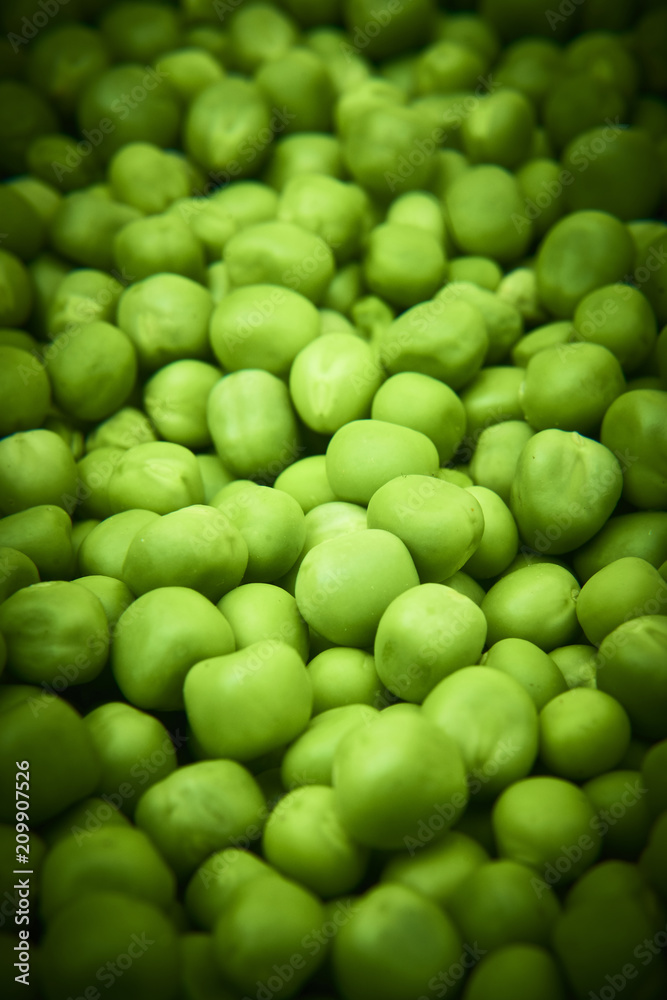 Fresh green peas background texture top view
Fresh green peas background texture top view