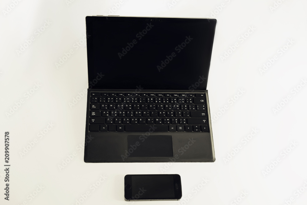 laptop and mobile phone on white background laptop and mobile phone on white background