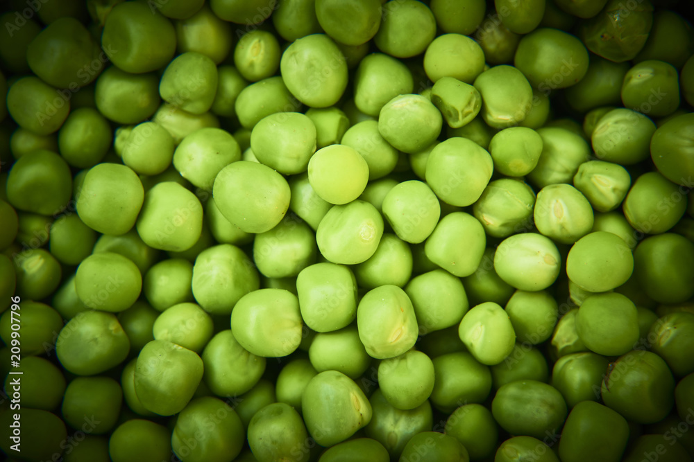 Fresh green peas background texture top view
Fresh green peas background texture top view