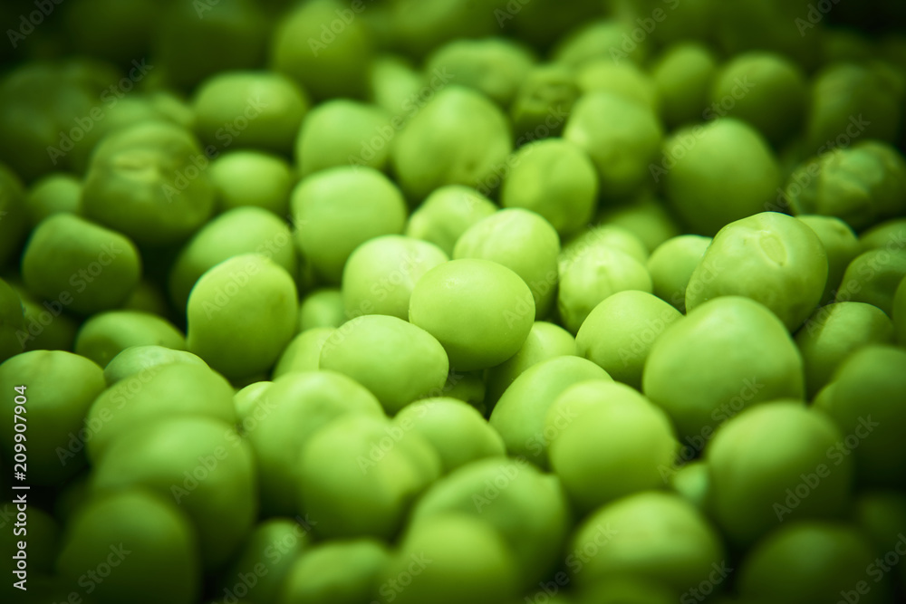 Fresh green peas background texture top view
Fresh green peas background texture top view