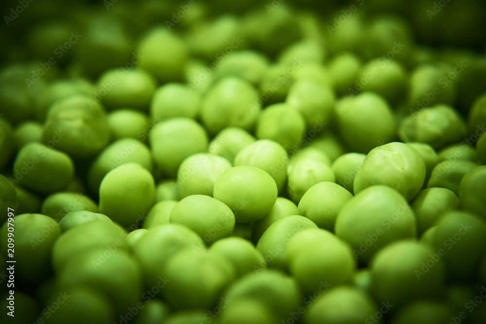 Fresh green peas background texture top view
Fresh green peas background texture top view
