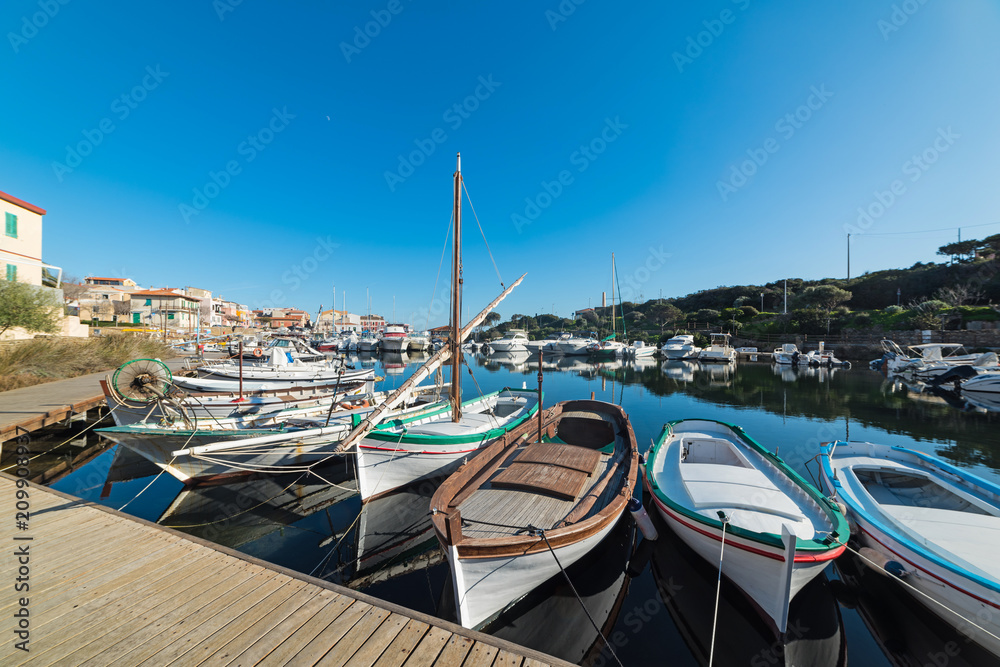 wooden boats in Stintino harbor