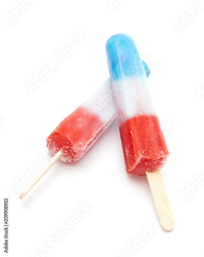 Obraz na plátně Red White and Blue Popsicles on a White Background