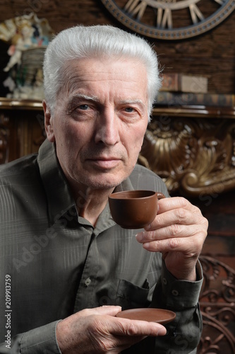 senior man drinking tea