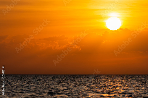 Fototapeta Naklejka Na Ścianę i Meble -  Beautiful cloudscape over the sea, scenic dramatic golden sunset