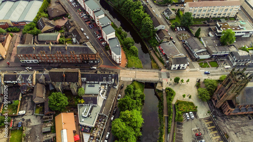 Low level aerial image of the Forth and Clyde Canal in the town of Kirkintilloch in Scotland.