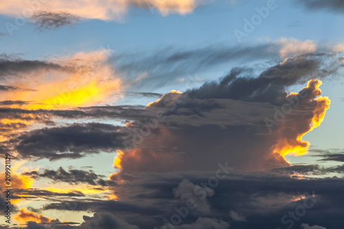 Fancy shapes of clouds at evening sunset. © Sivenkov