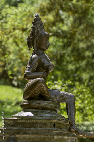 Brass statue of the Goddess Parvati.  Statue of Indian goddess of fertility, love and devotion. © notistia