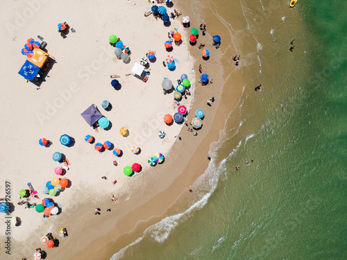 Aerial view of colorful umbrella on the beach