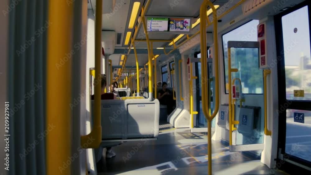 inside a tram view with people inside a tram view with people