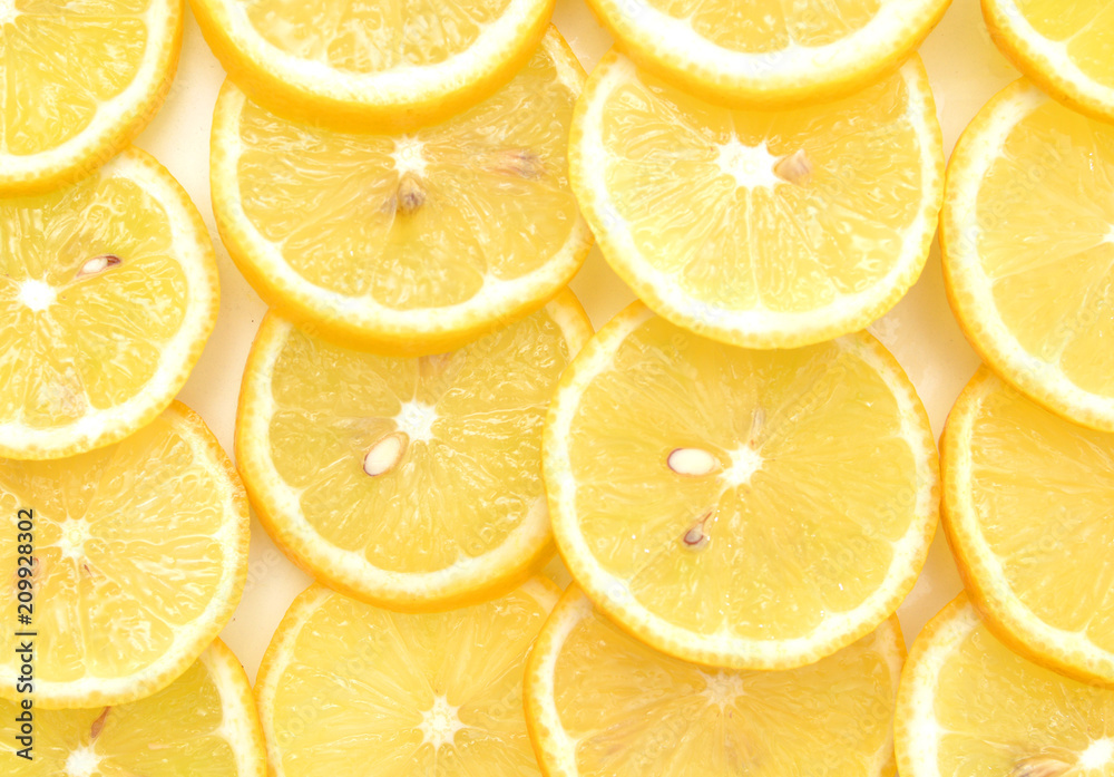 slices of lemon on background