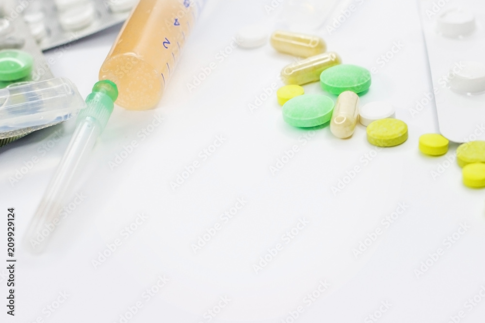 Background and texture with medicines. White background. Background and texture with medicines. White background.