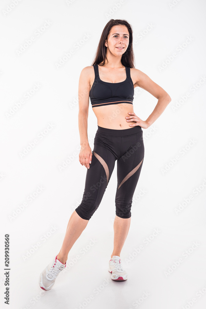 Athlete engaged in fitness on a white background Athlete engaged in fitness on a white background