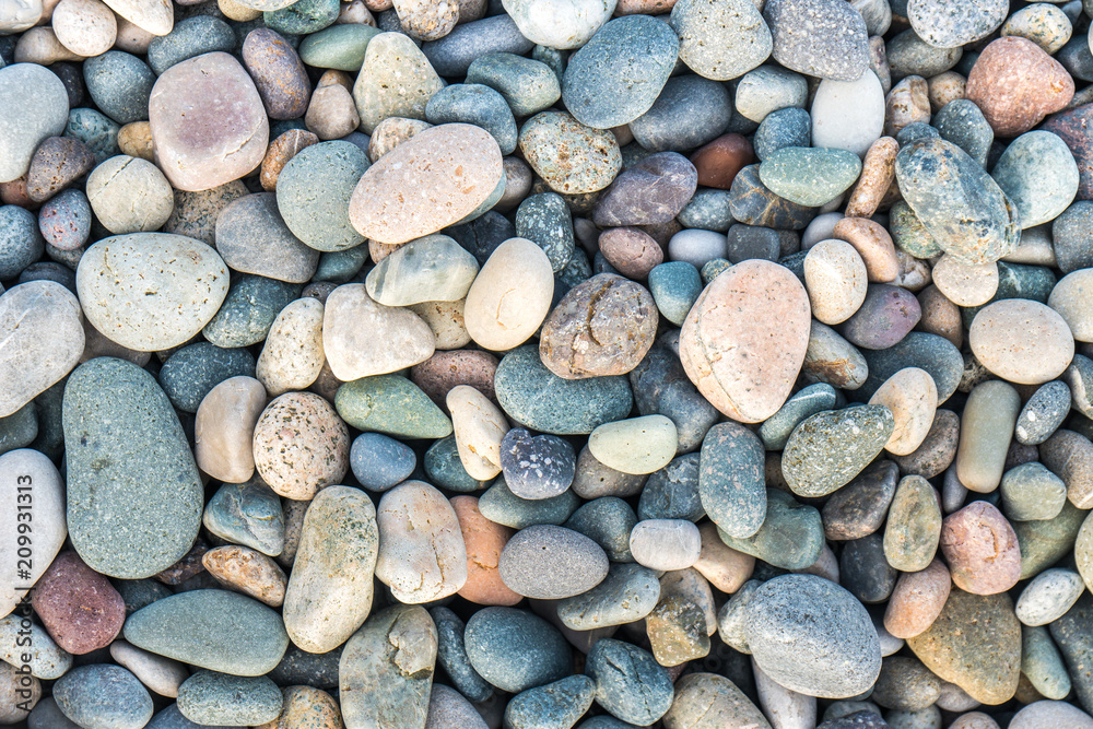Close up of rounded and polished beach rocks Close up of rounded and polished beach rocks