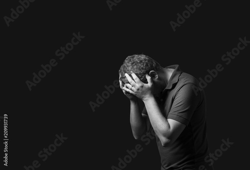sad man with depression photo