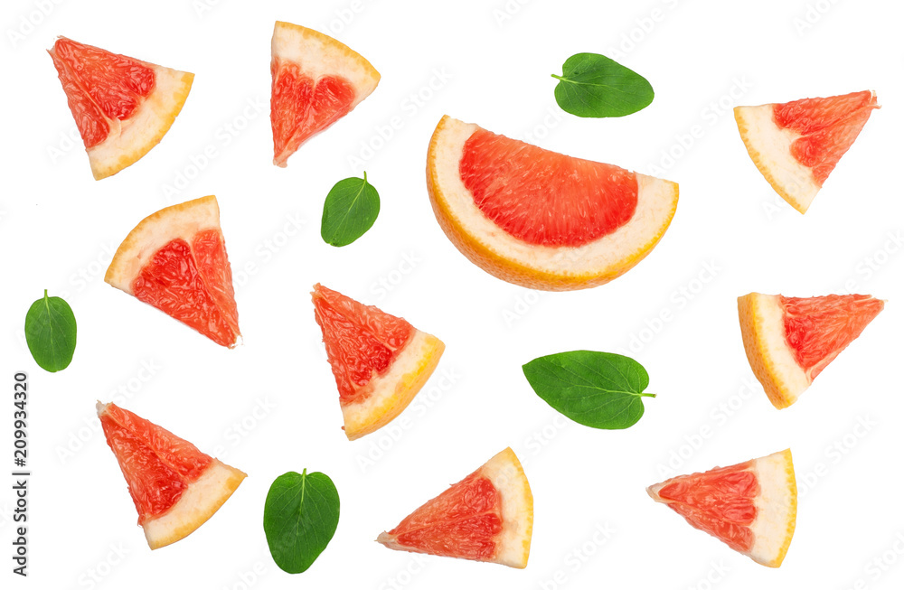 Sliced pieces of grapefruit isolated on white Sliced pieces of grapefruit isolated on white