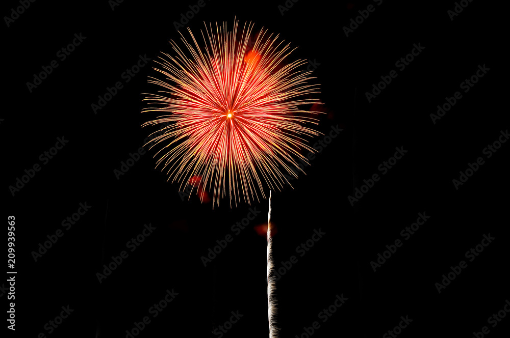 Amazing red fireworks on dark background.